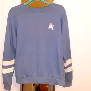 Blue Unicorn sweater.